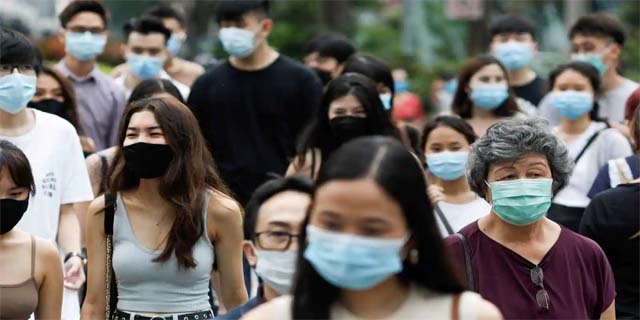 सिंगापुर में कोविड-19 के बढ़ते मामलों के बीच लोगों से मास्क लगाने की अपील