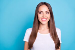 Close-up portrait of her she nice-looking attractive lovely gorgeous lovable winsome cheerful cheery straight-haired girl isolated over bright vivid shine blue background