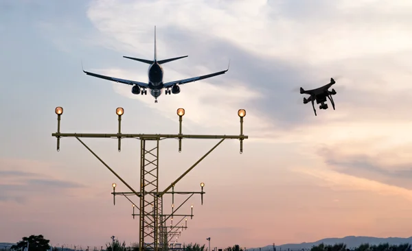 Drone_flying_near_an_aircraft