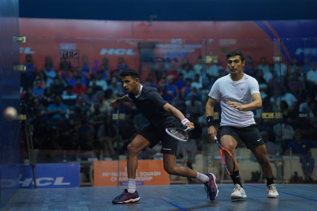 Velavan-Senthilkumar-and-Abhay-Singh-in-a-final-fight-for-the-winner-title-at-HCL-80th-National-Squash-Championship