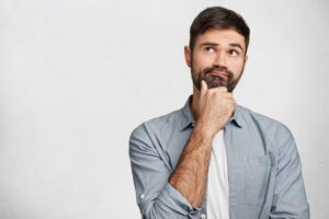 expressive-bearded-man-wearing-shirt_273609-5928