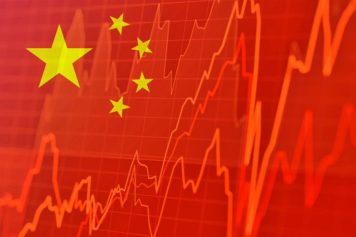 Chinese flag and stock market indicators - concept of Chinese economic trends